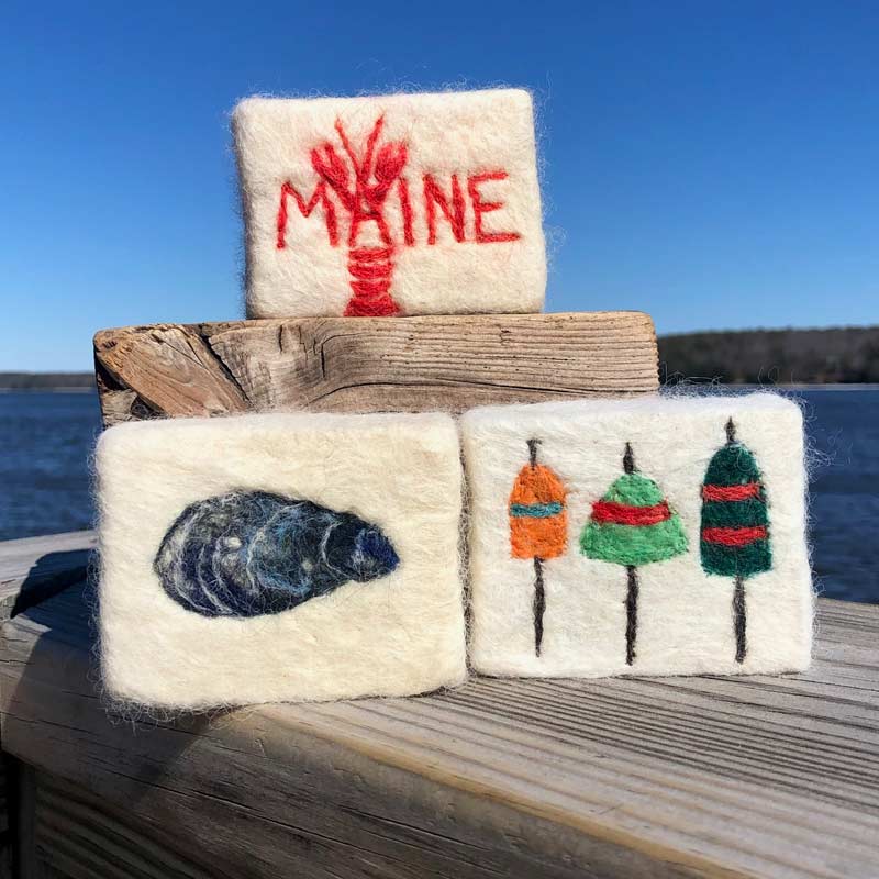 Alpaca Fleece, Felted Soaps with Red, Maine Lobster, Clam Shell and buoys.