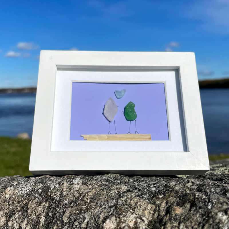 Sea Glass Love Birds with Light Blue Sea Glass Heart on violet background