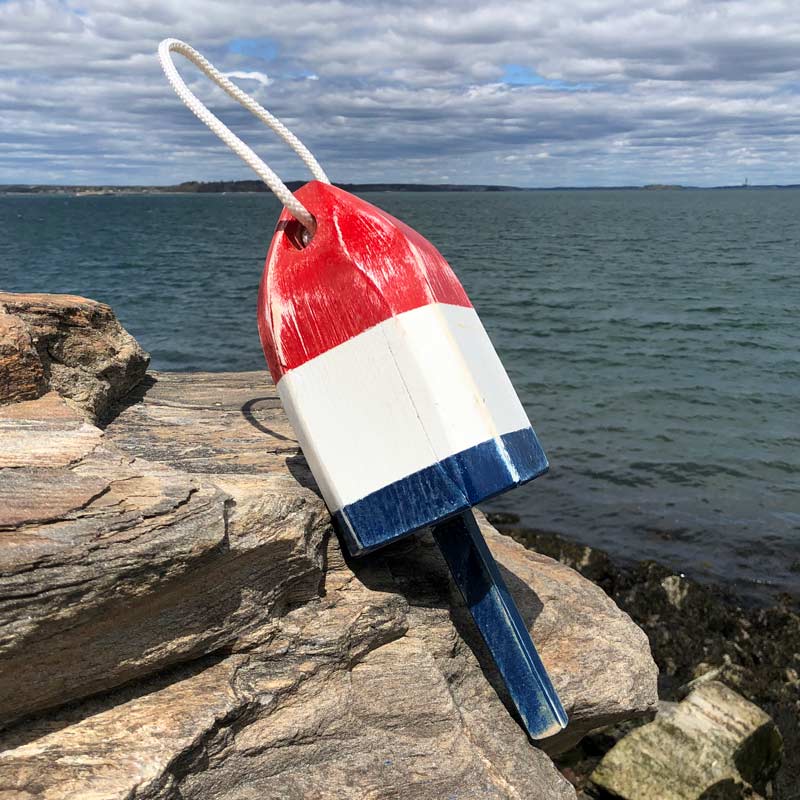 Small, Distressed, Red, White and Blue Buoy.