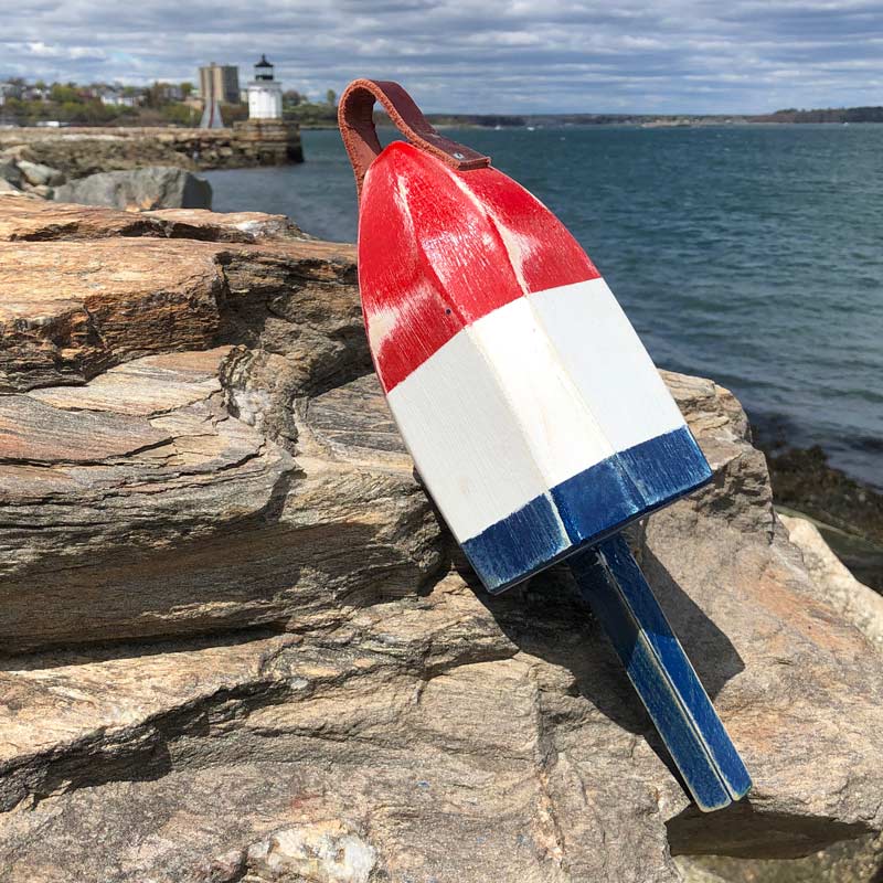 Small, Distressed, Red, White and Blue Buoy.