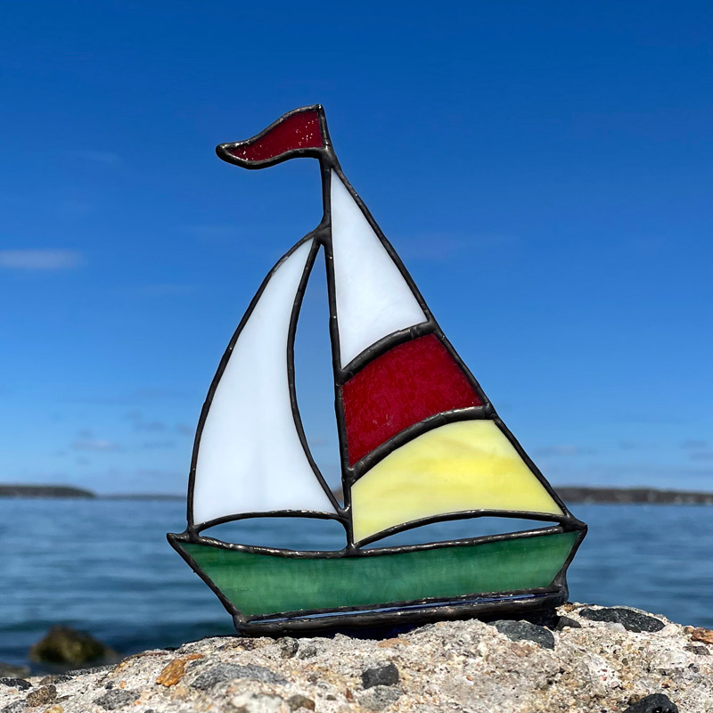 Red & Yelllow Sails on a Green Boat Stained Glass Sailboat