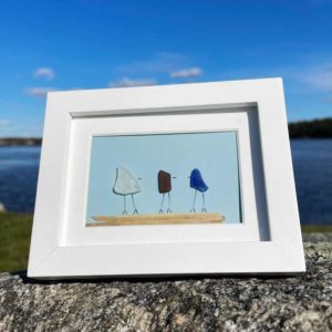 Clear, Brown and Blue Sea Glass on Light Blue