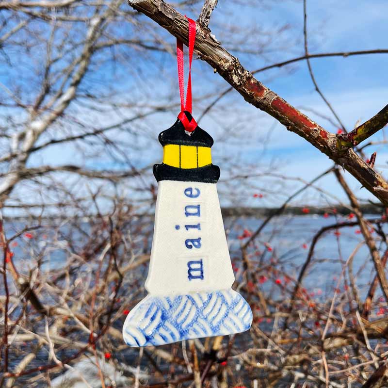 Lighthouse with blue waves Ornament